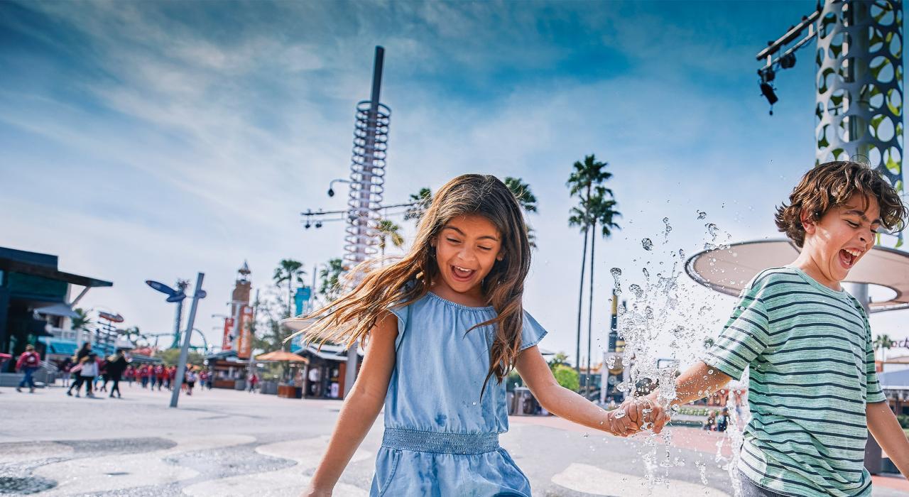 All smiles while playing on a splash pad at Universal CityWalk All smiles while playing on a splash pad at Universal CityWalk