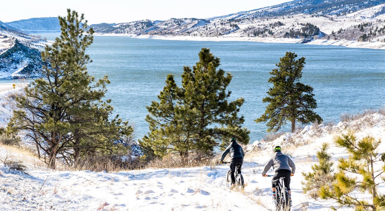 Cycling snow-covered trails on fat-tire bikes at Horsetooth Reservoir