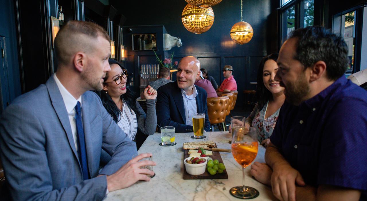 Enjoying beverages and a cheese board at Carpenter Bar in the historic downtown