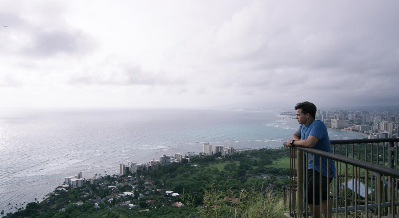 Keanu Asing overlooking Oahu, Hawaii, from Diamond Head Keanu Asing overlooking Oahu, Hawaii, from Diamond Head