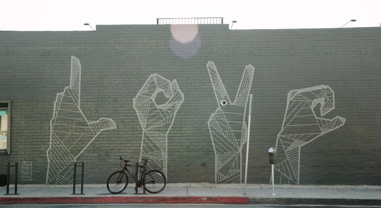 “Love” by Allison Kunath at The Brixton – one of the city's 170-plus street art murals