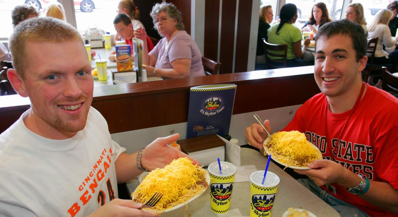 Enjoying Cincinnati Chili, a tasty must-try for all visitors Enjoying Cincinnati Chili, a tasty must-try for all visitors