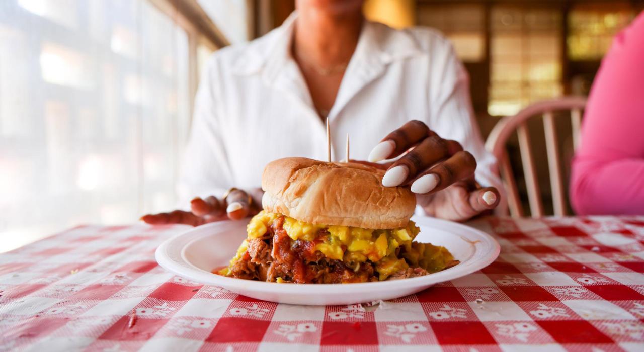 Enjoying Memphis-style barbecue at local restaurant Payne's Bar-B-Que