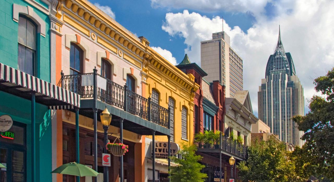 Colorful buildings line historic Dauphin Street in the heart of downtown Mobile