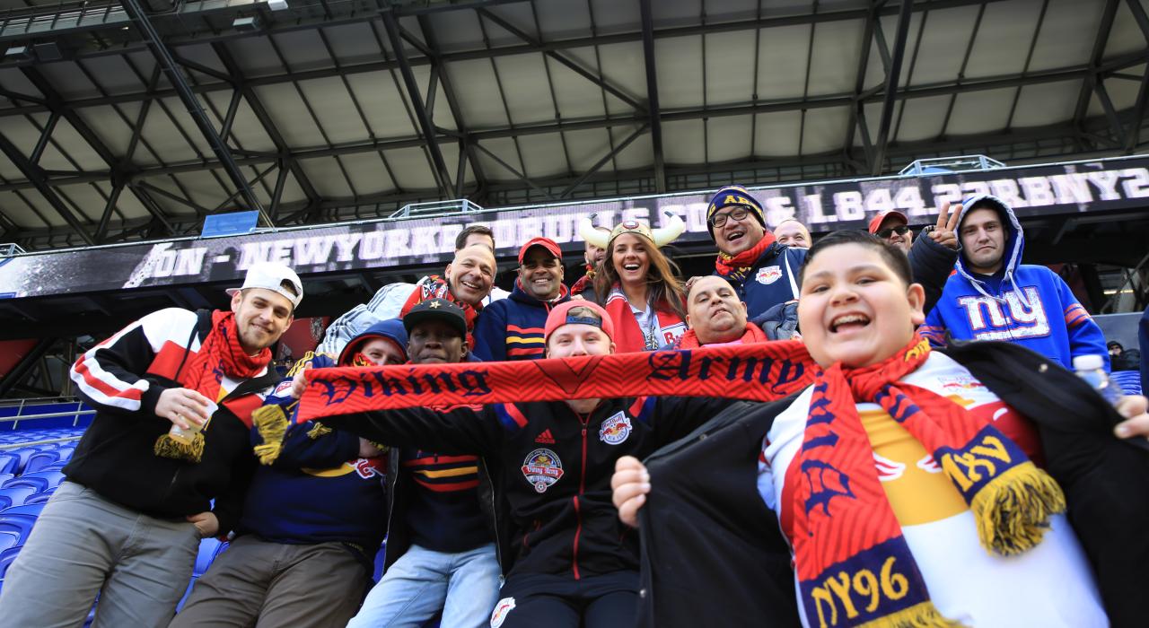 Fans cheer on professional soccer team New York Red Bulls at the state-of-the-art Red Bull Arena
