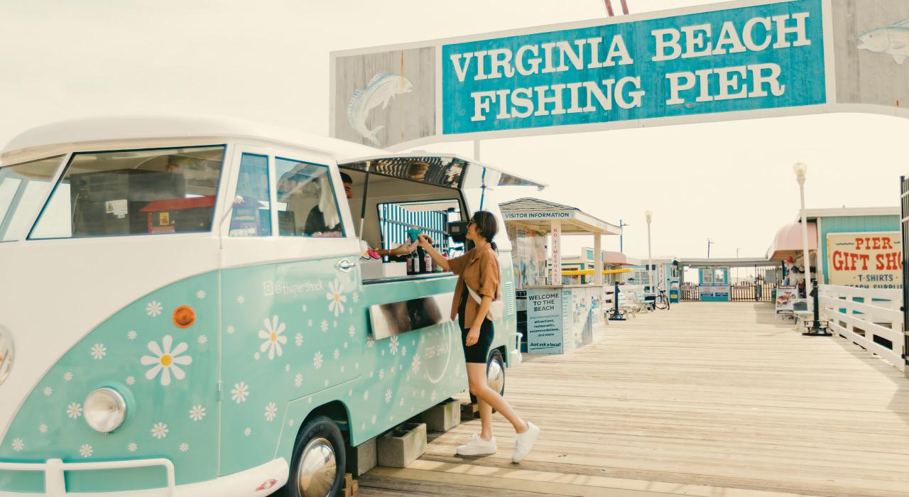 Colorful shops and food trucks line the Virginia Beach Fishing Pier Colorful shops and food trucks line the Virginia Beach Fishing Pier