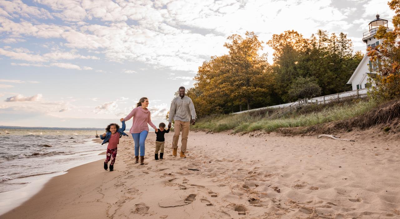 Strolling the beaches of the Old Mission Peninsula near the Mission Point Lighthouse Strolling the beaches of the Old Mission Peninsula near the Mission Point Lighthouse