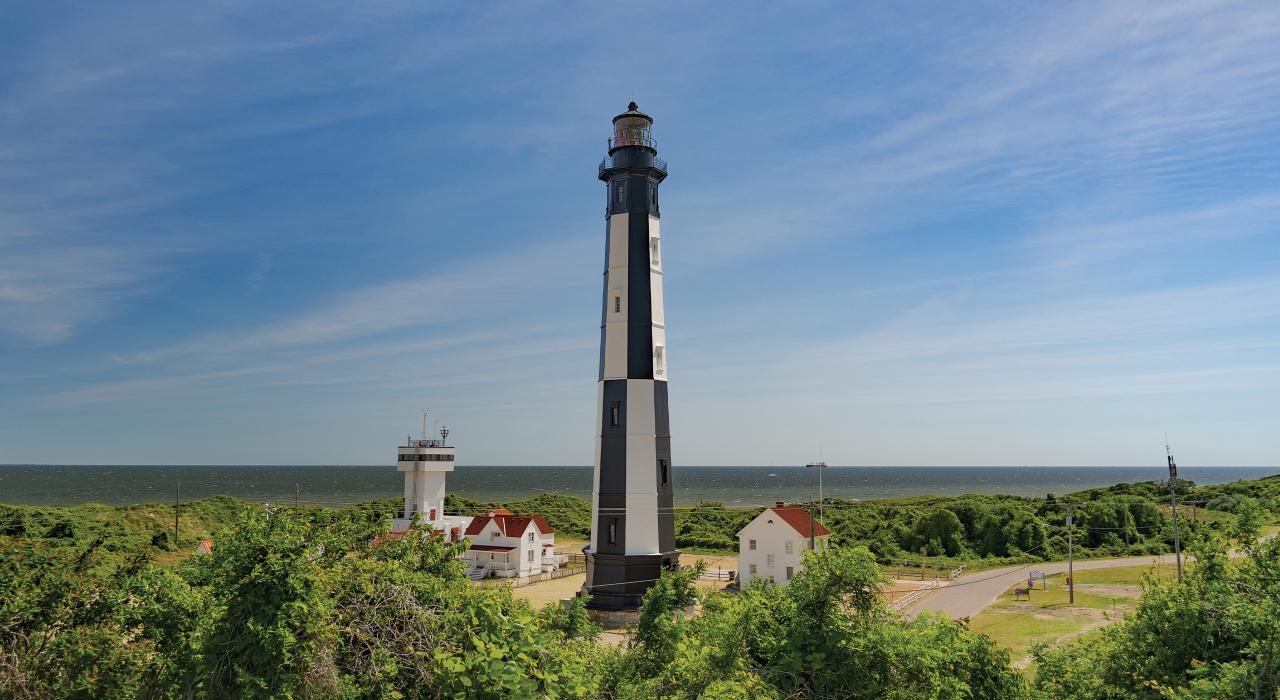 The Cape Henry Lighthouse rises above historic Fort Story The Cape Henry Lighthouse rises above historic Fort Story