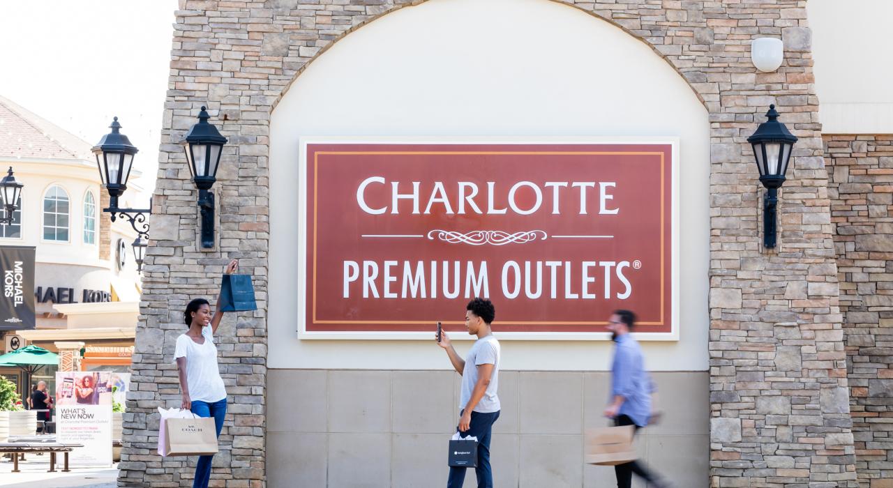 Shopping for bargains at Charlotte Premium Outlets Shopping for bargains at Charlotte Premium Outlets