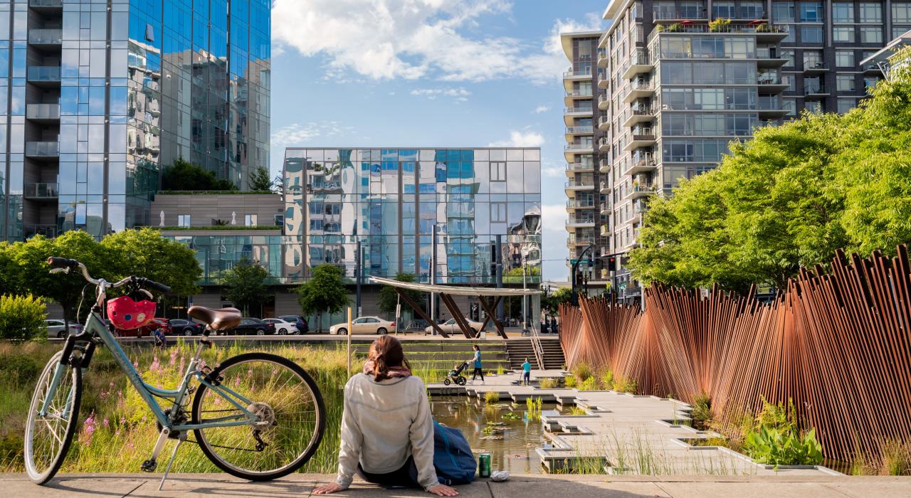 A cyclist relaxes in Tanner Springs Park in the lively Pearl District A cyclist relaxes in Tanner Springs Park in the lively Pearl District