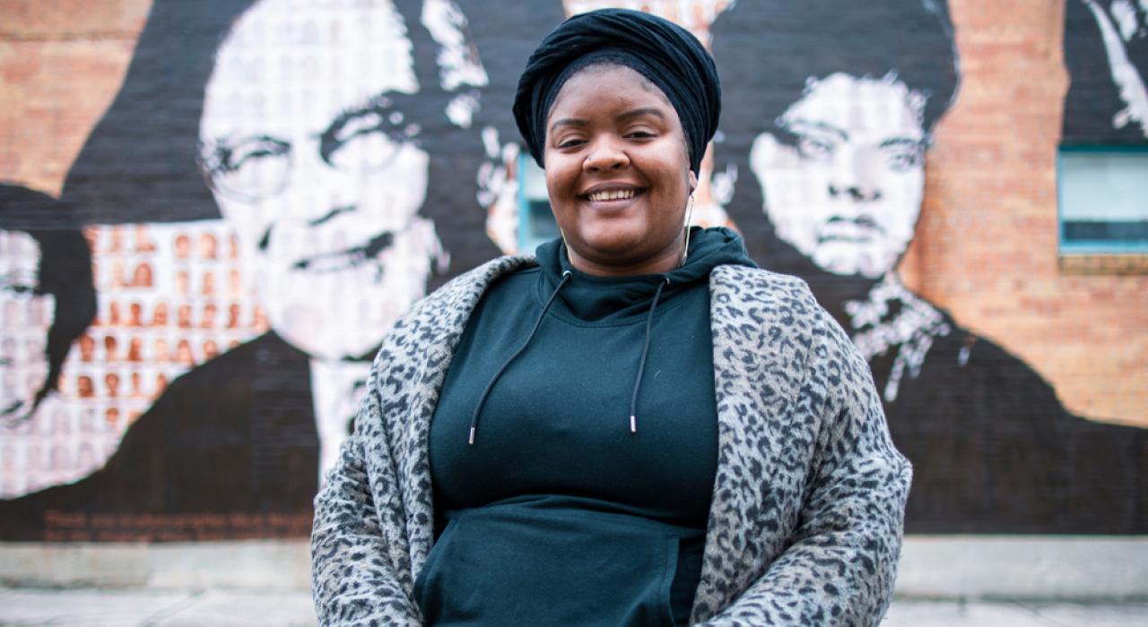 Victoria Jones posing in front of public art in Memphis, Tennessee Victoria Jones posing in front of public art in Memphis, Tennessee