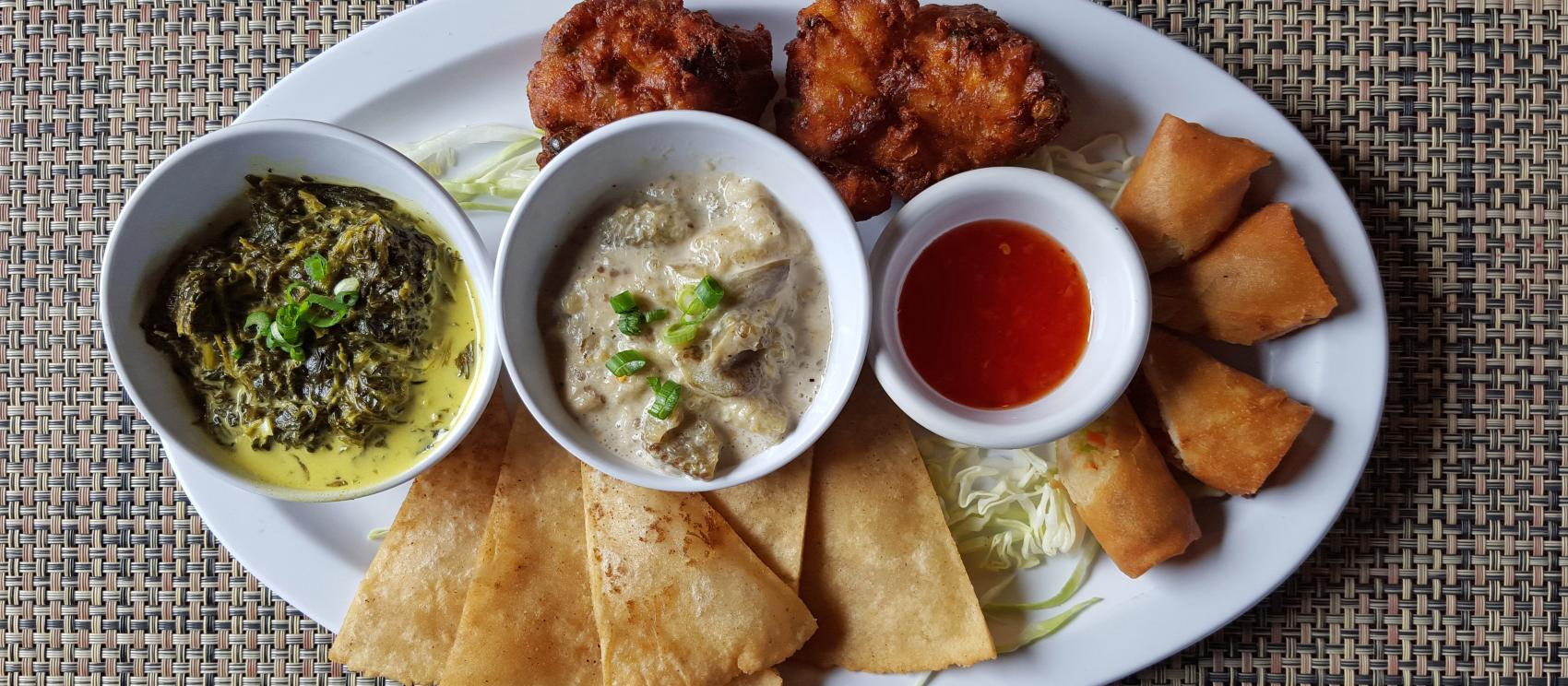 滿是當地精選佳餚的查莫洛獵人拼盤 滿是當地精選佳餚的查莫洛獵人拼盤