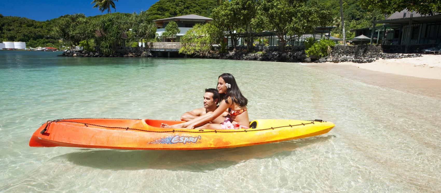 Kayaking in shallow waters at Sadie’s by the Sea resort hotel in Pago Pago