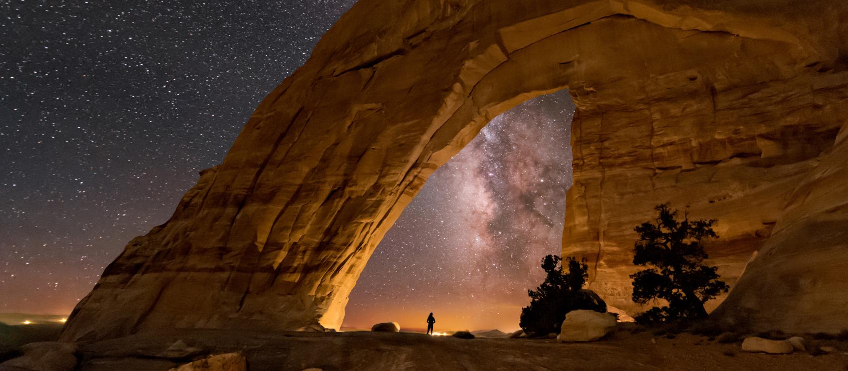 An epic starry night as seen through White Mesa Arch on Navajo lands An epic starry night as seen through White Mesa Arch on Navajo lands