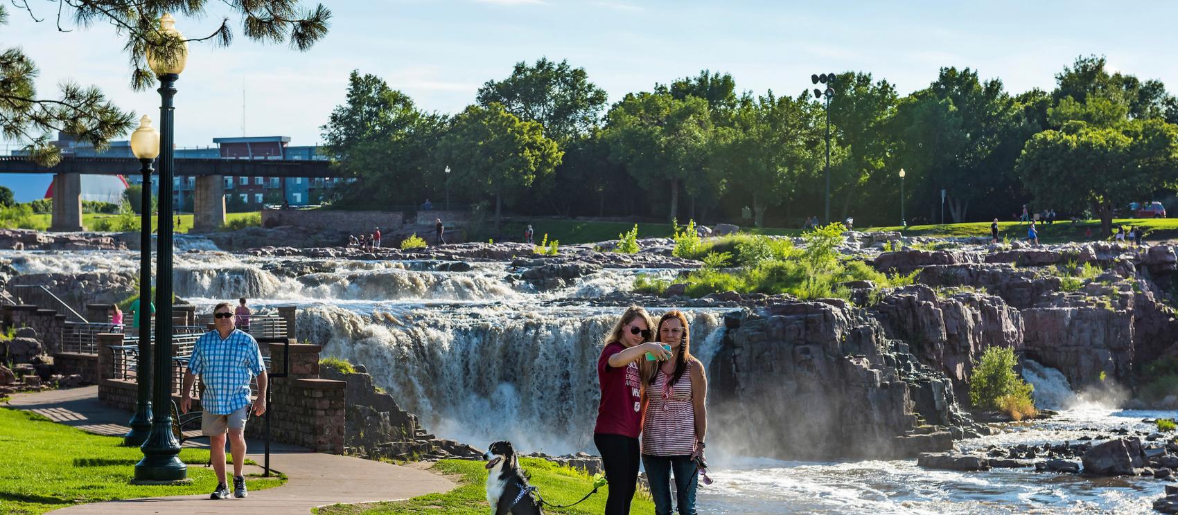 Snapping a selfie in front of Sioux Falls’ namesake waterfall