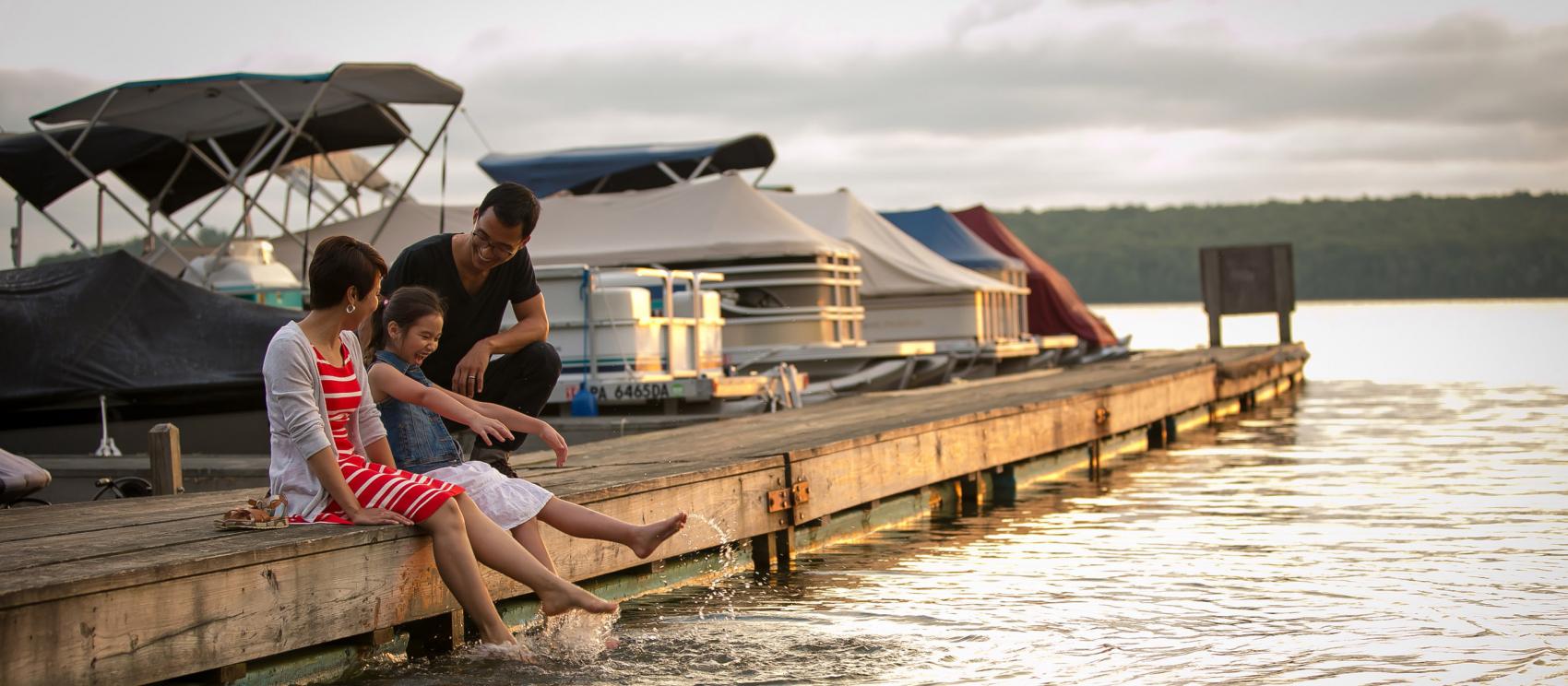 Family enjoying the sunset at Lake Wallenpaupack in the Pocono Mountains