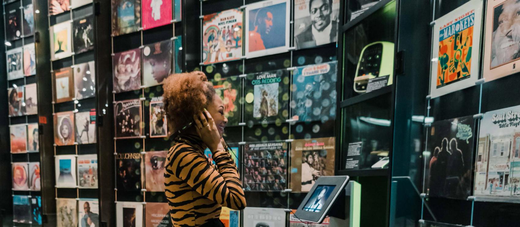 Listening to classic hits at the Stax Museum of Soul in Memphis, Tennessee