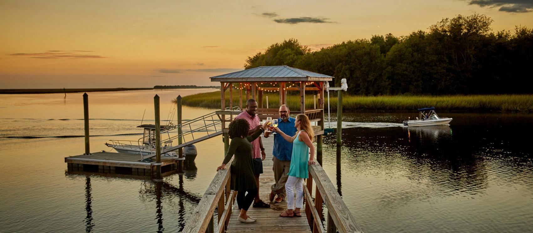 Sipping wine on a dock overlooking the marsh in McClellanville, South Carolina