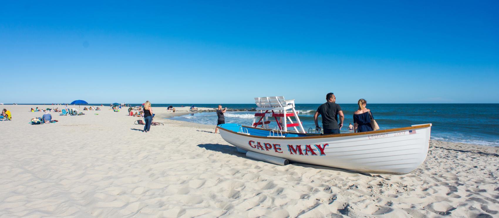 Beachgoers enjoying the sun and sand in Cape May