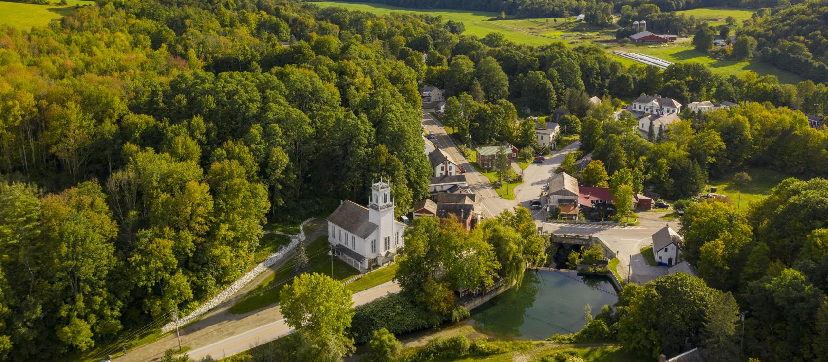 Lush summer foliage in Pawlet, one of the state’s 251 cities and towns